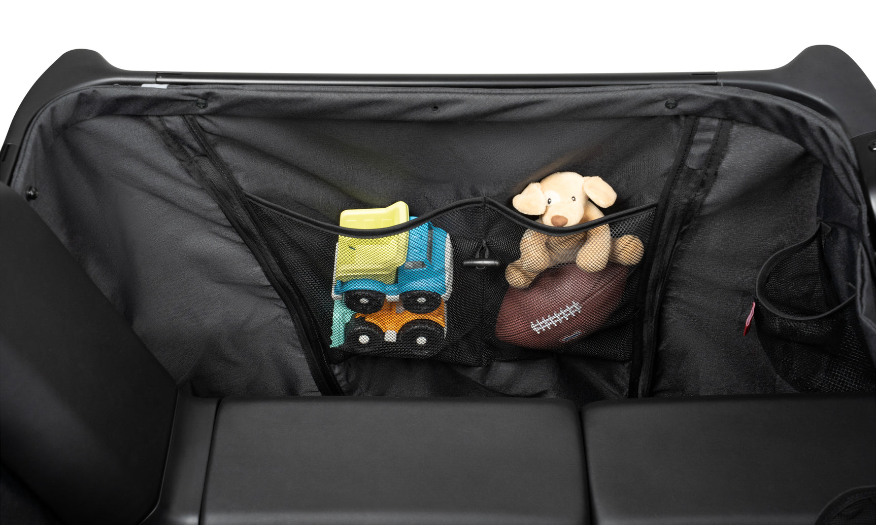Close up of kid toys in the storage pouches inside the fabric liner
