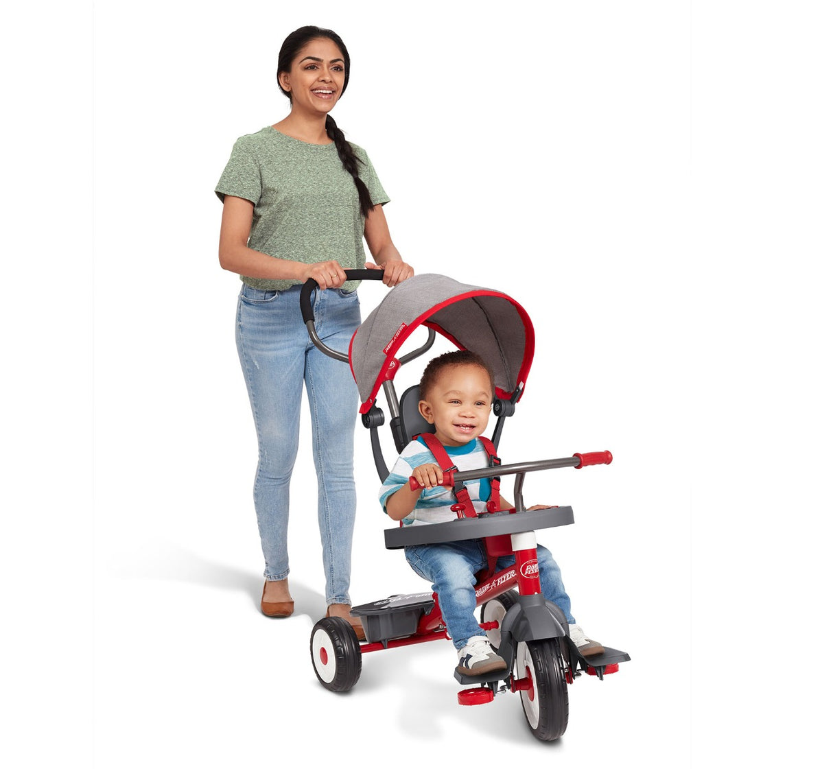 Woman Pushing Boy Riding 5-In-1 Stroll ‘N Trike® In Infant Trike Mode