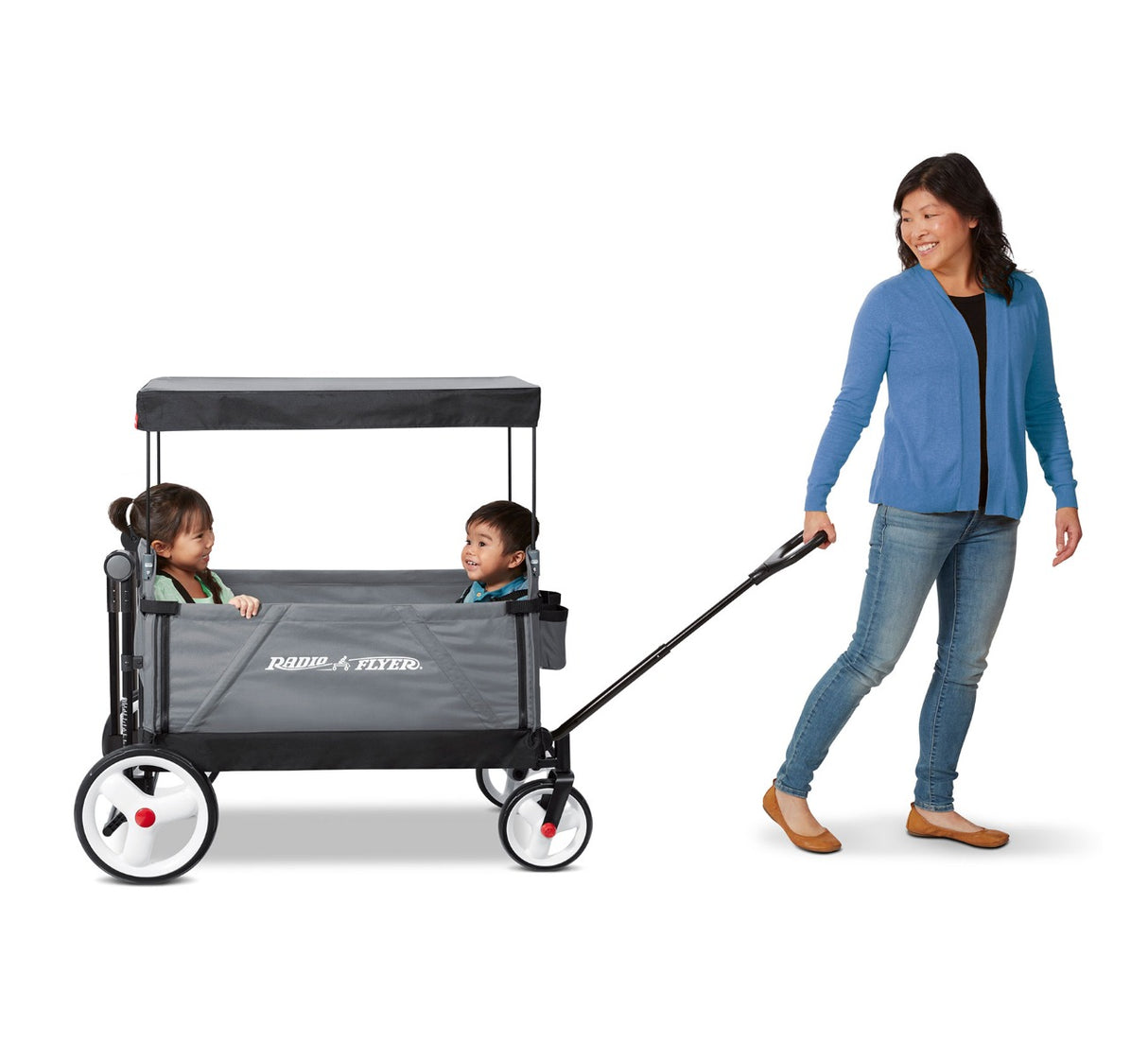 Woman Pulling City Luxe Stroll 'N Wagonâ„¢ With Boy & Girl Riding