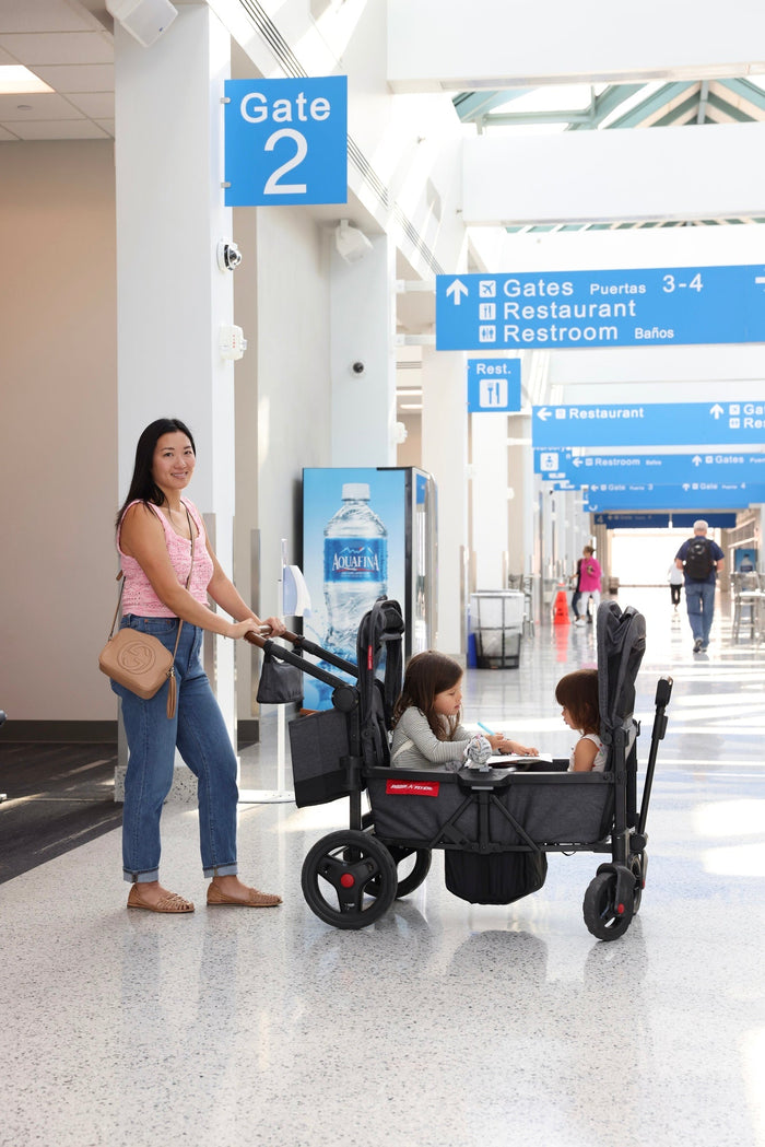 mom with radio flyer wagon at airport