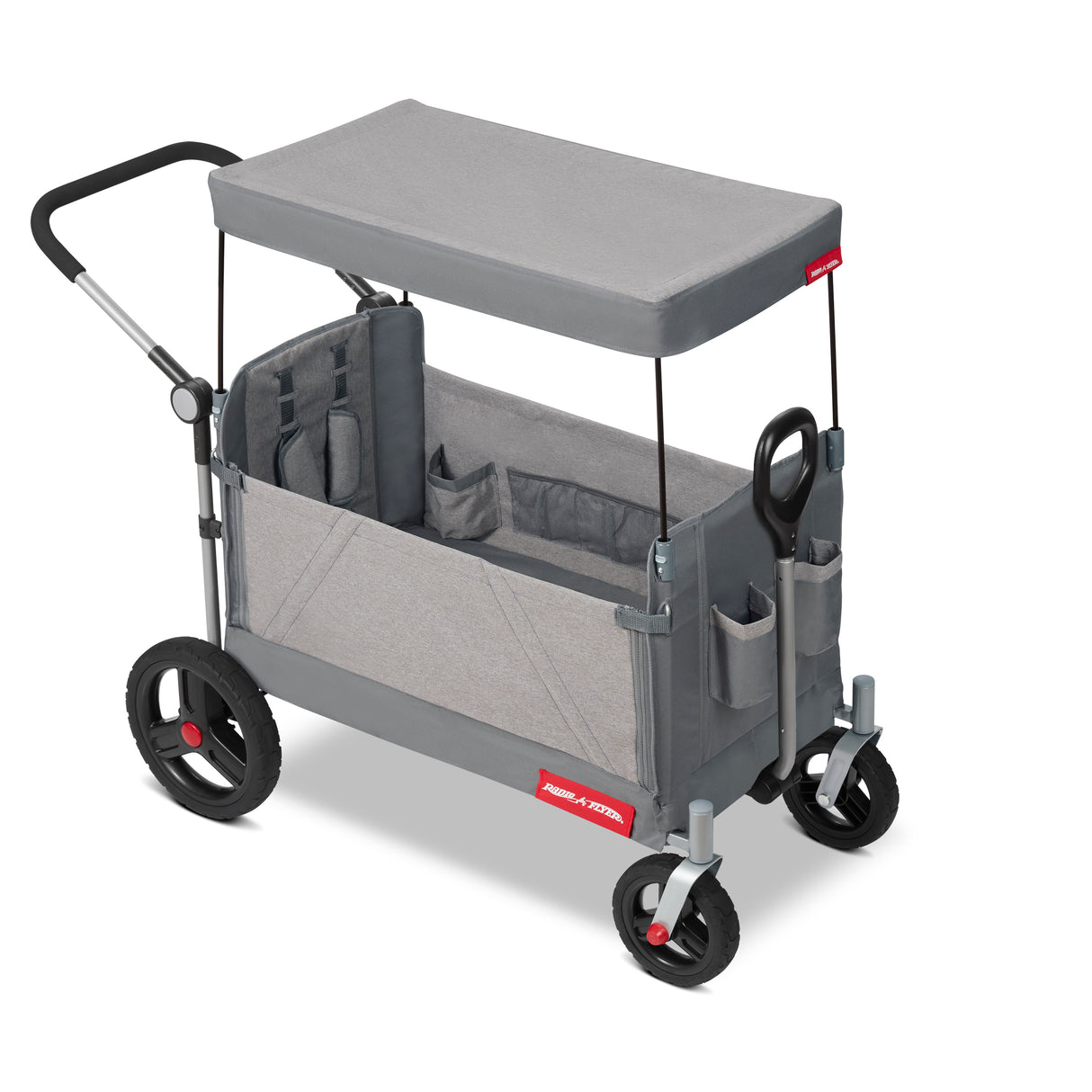 Gray folding wagon with a canopy, pull handle, and adjustable push bar on a white background