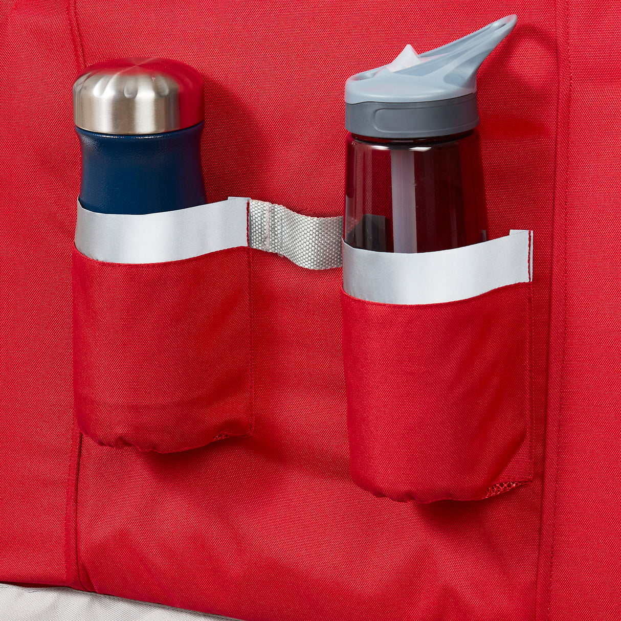 Zoomed image of two water bottles in the front cupholders