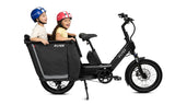 Two kids riding in the back of the cargo hoop fabric liner on a white background
