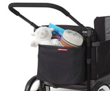 Rear storage bag on a wagon filled with a blanket, stuffed animal, and book
