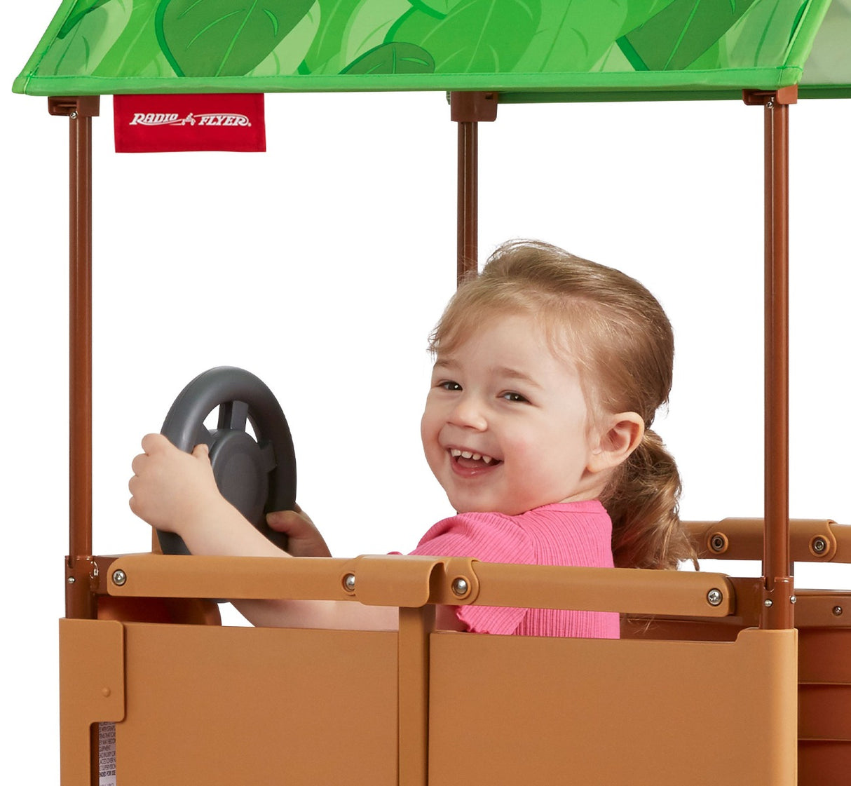 Girl playing with built-in rotating steering wheel