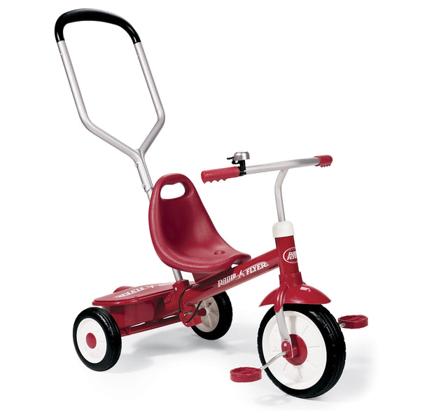 Man Pushing Boy Riding Steer & StrollÂ® Trike